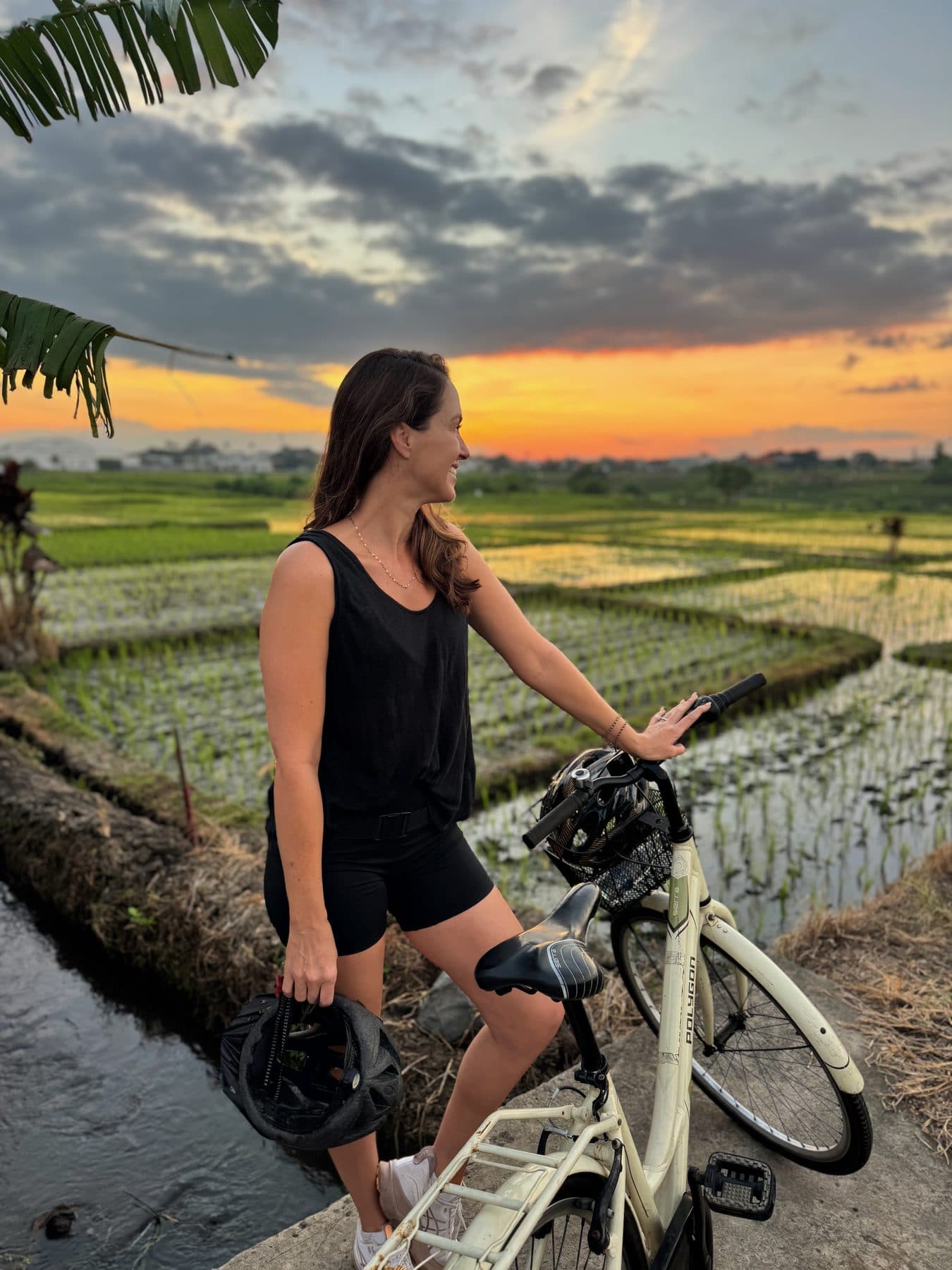 The sun coming up over the flooded rice terraces outside Canggu on the Escape Haven morning bike ride