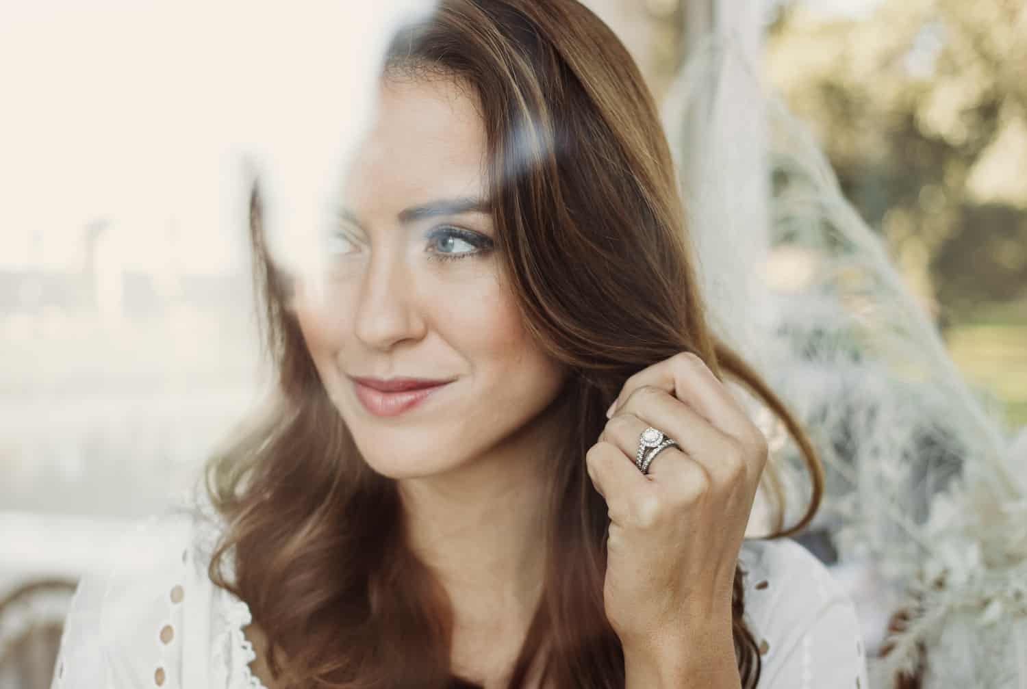 Elegant diamond engagement ring in white metal setting, before and after jewellery redesign