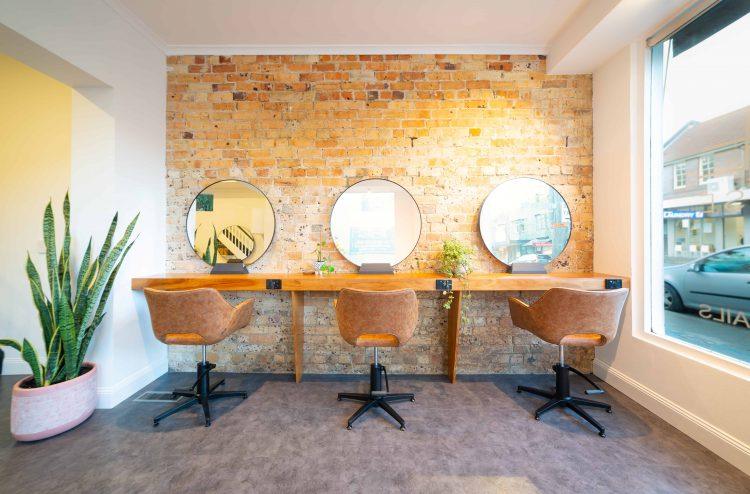 The mani/pedi room at Bare Beauty House opens onto a leafy courtyard
