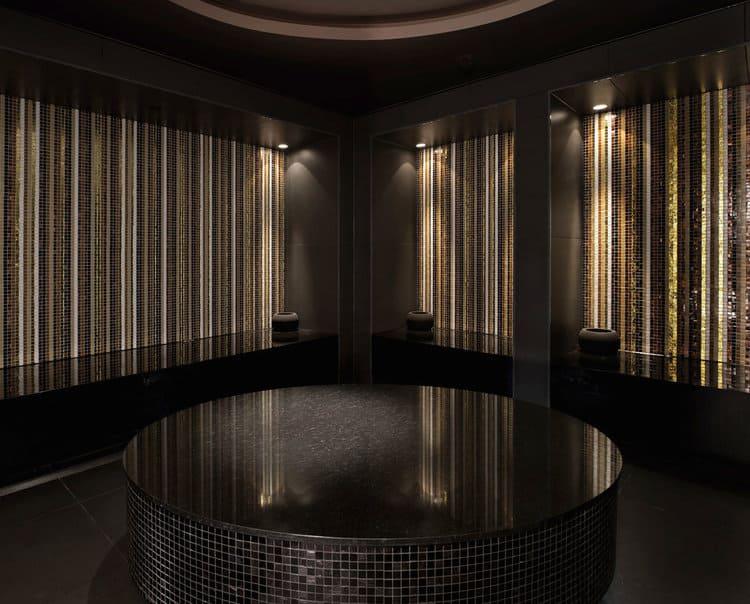 Interior of The Darling Spa with burnished gold and charcoal tones