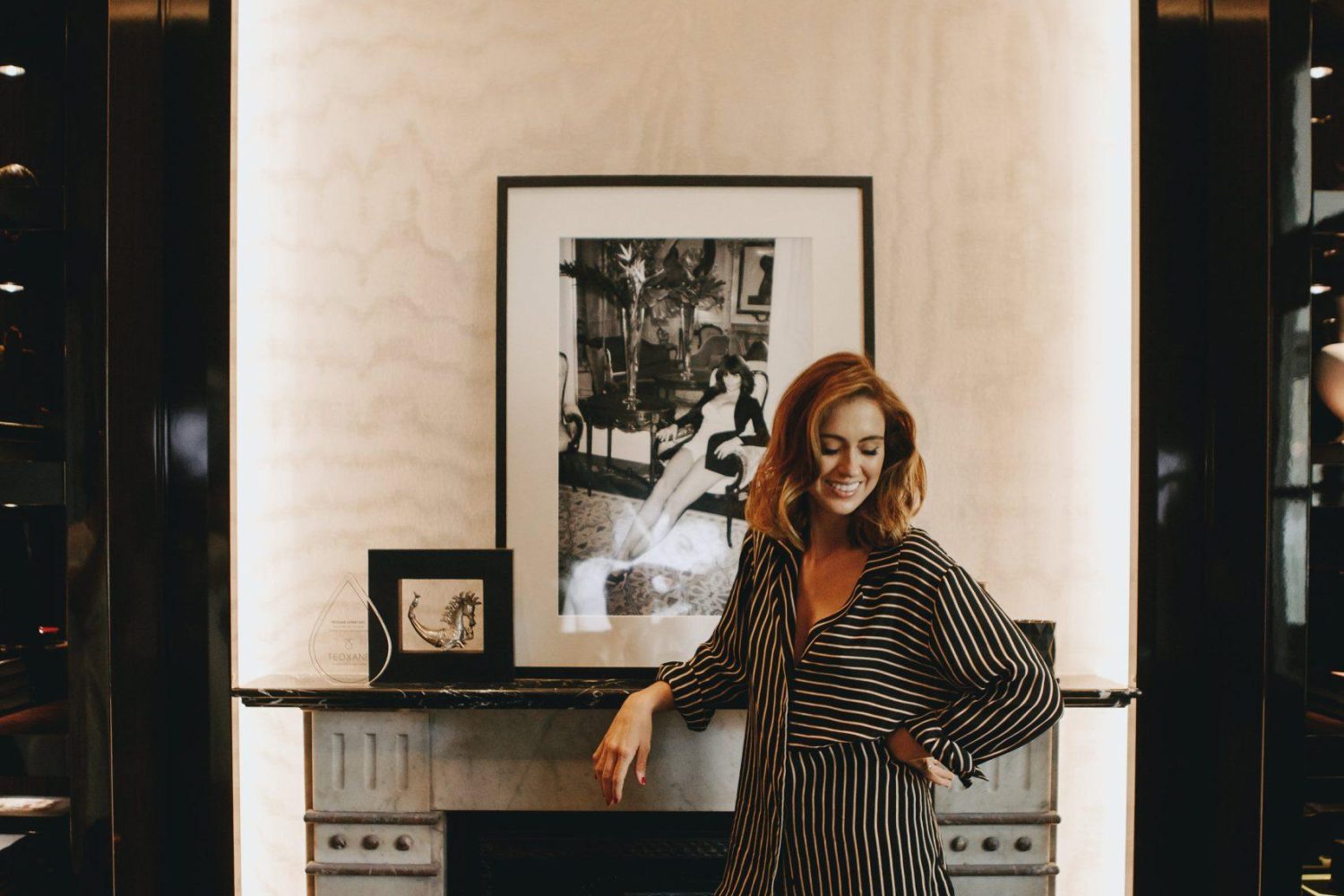 Woman in a robe in an All Saint Skin Clinic treatment room